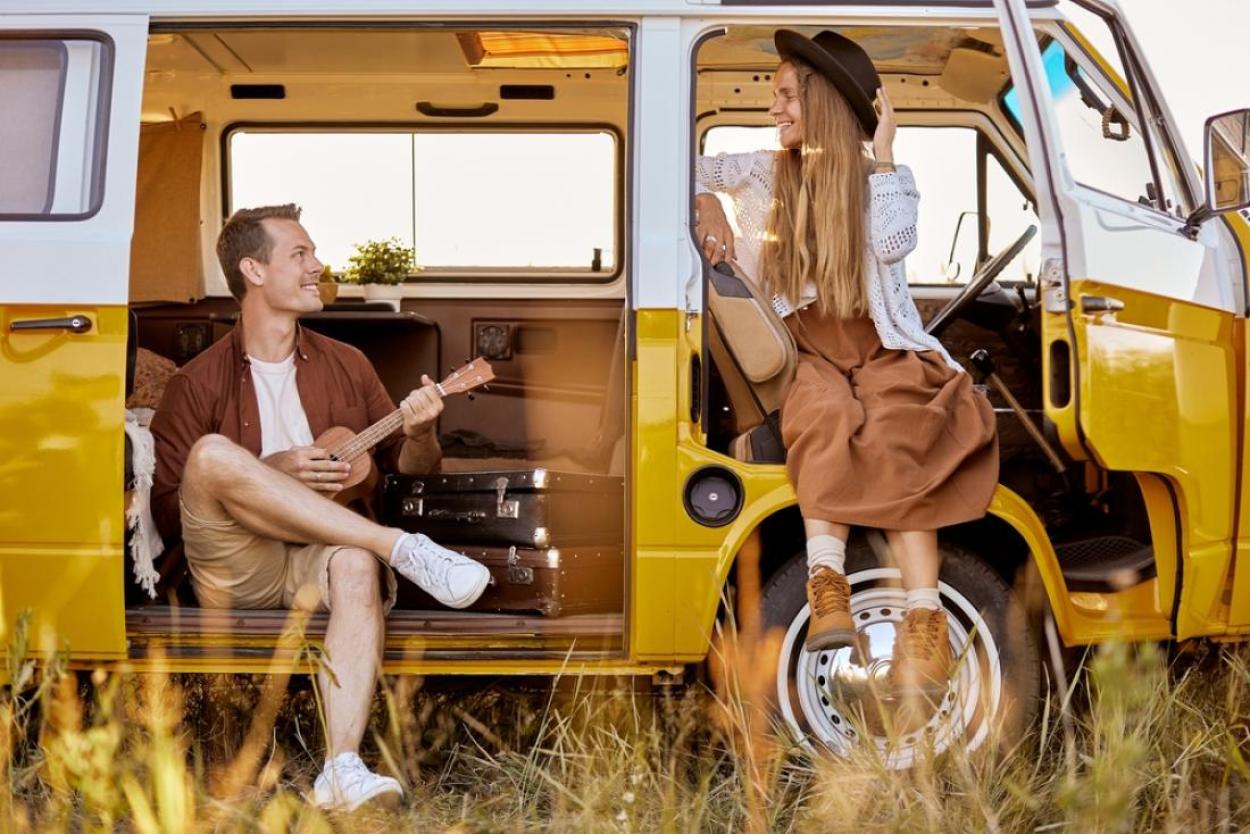 Couple singing in a van