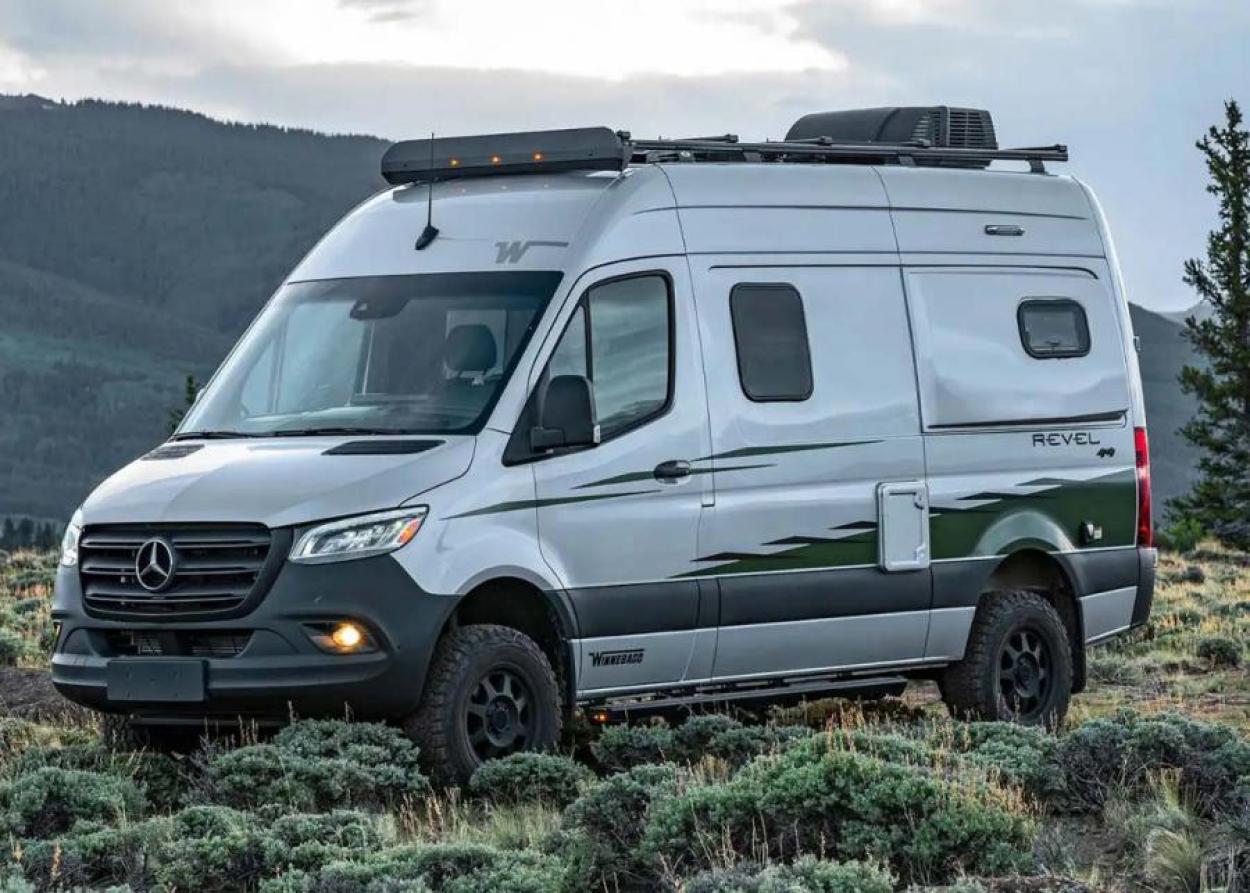 Gray 2023 Winnebago Revel parked in mountainous area