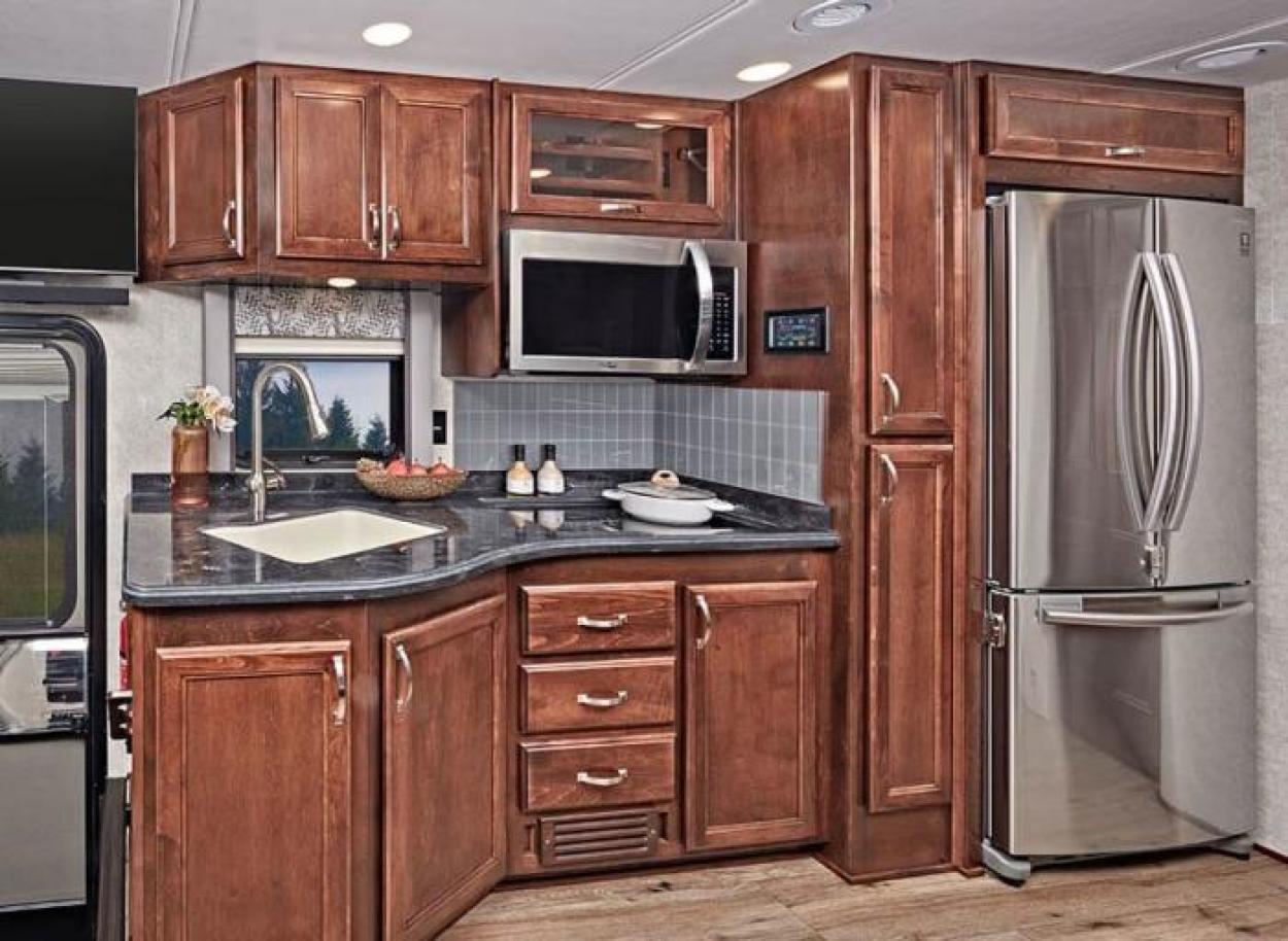 Kitchen inside 2022 Renegade Verona featuring stainless steel appliances