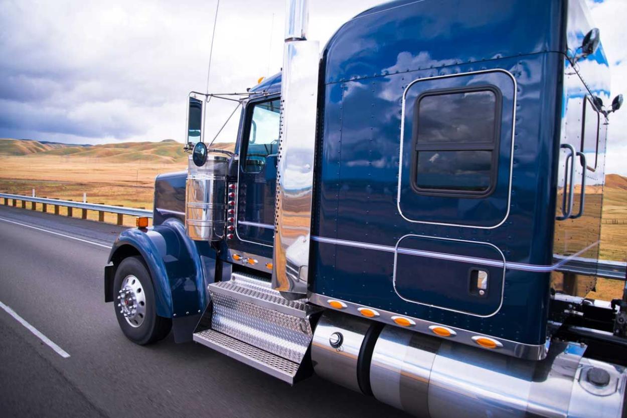 Sideview of a truck on the open road