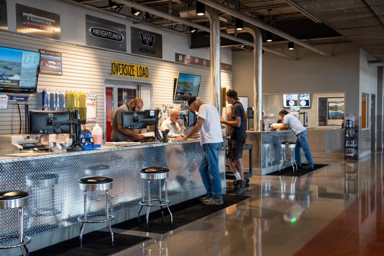 Person checking out inside a Transwest location