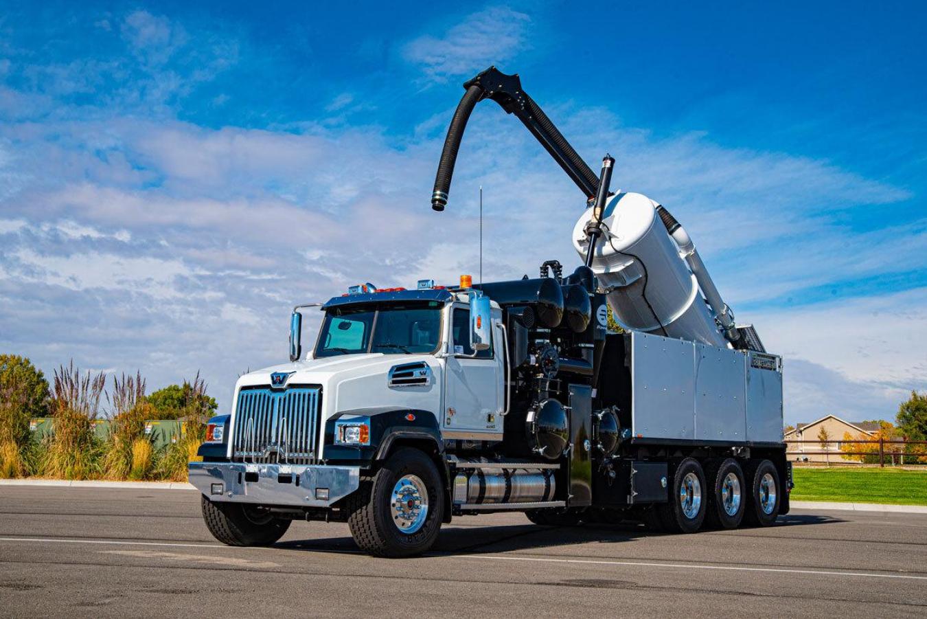 White and black Rival hydrovac truck