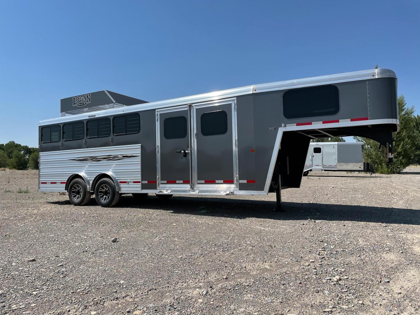 An exterior shot of a grey Logan Coach Trailer