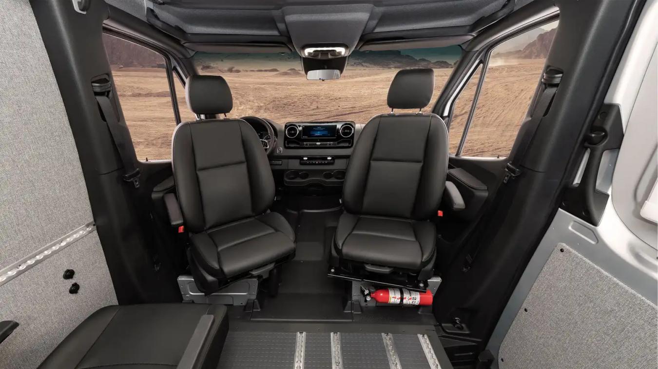 View of driver and passenger seats in the Winnebago Adventure Wagon