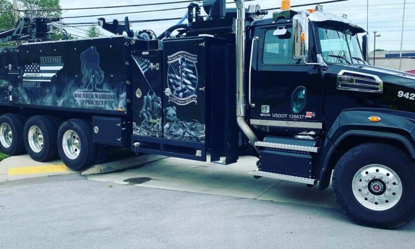 Black branded Rival hydrovac truck