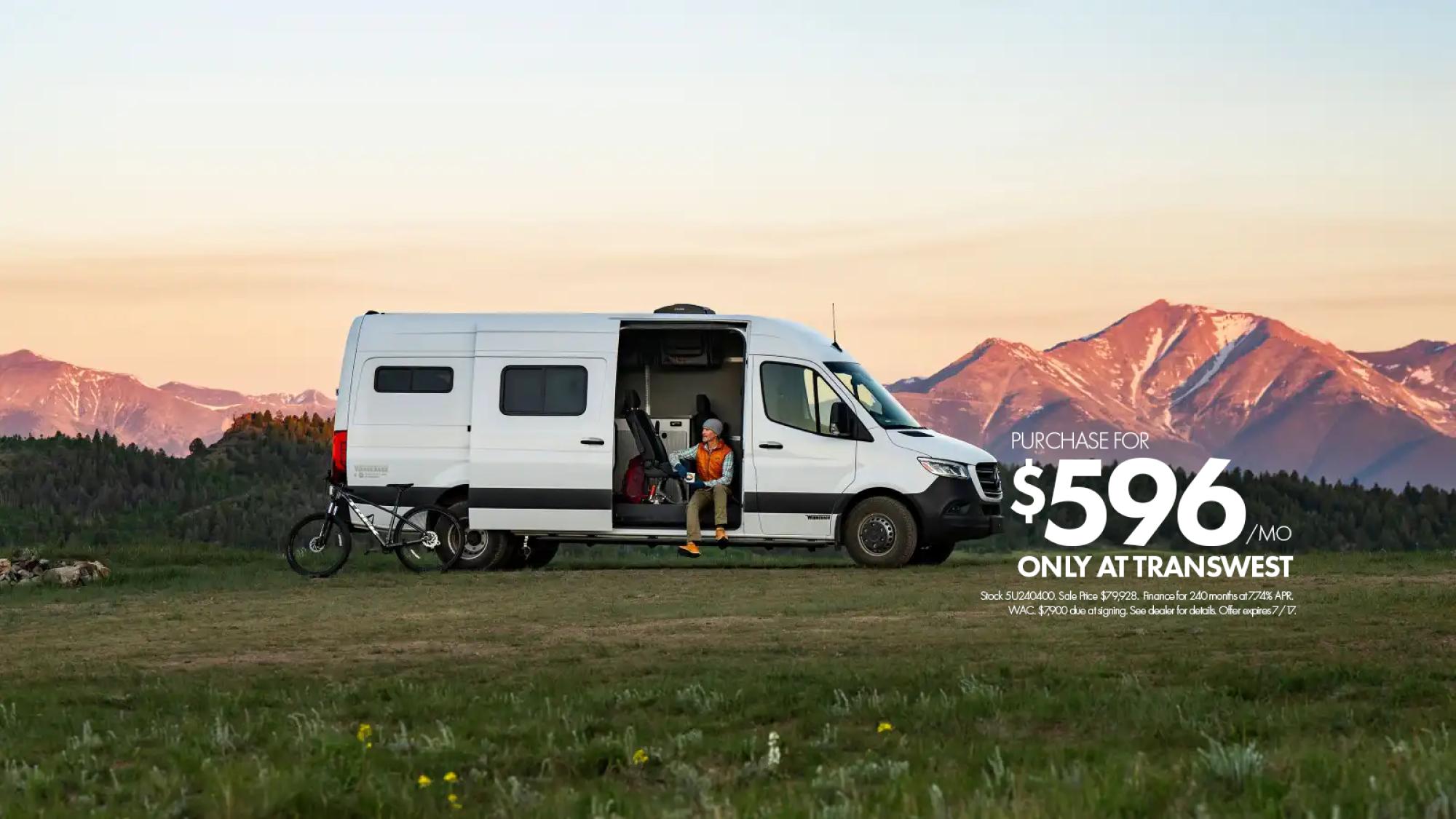 2023 Winnebago Adventure Wagon in front of a mountain vista